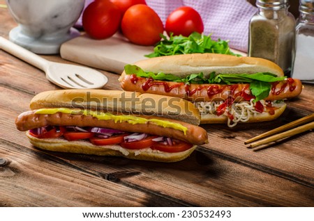 Variation on the red hot dogs, onion tomato, arugula and chilli peppers with chinese noodles