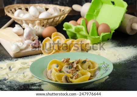 Tortellini stuffed mushrooms, parmesan cheese and organic garlic, sprinkled with seeds and nuts, topped with buttery reduction
