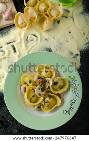 Tortellini stuffed mushrooms, parmesan cheese and organic garlic, sprinkled with seeds and nuts, topped with buttery reduction