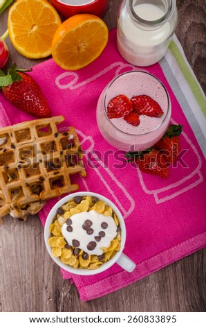 Strawberry smoothie and corn flakes, healthy breakfast