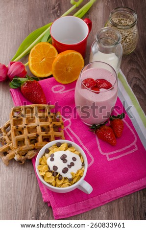 Strawberry smoothie and corn flakes, healthy breakfast