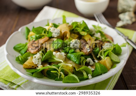 Fresh salad with roasted potatoes, mushrooms and lamb lettuce salad with mustard dip and blue cheese