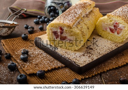 Sponge roll stuffed with strawberry cream