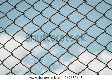 chain link fence blue sky