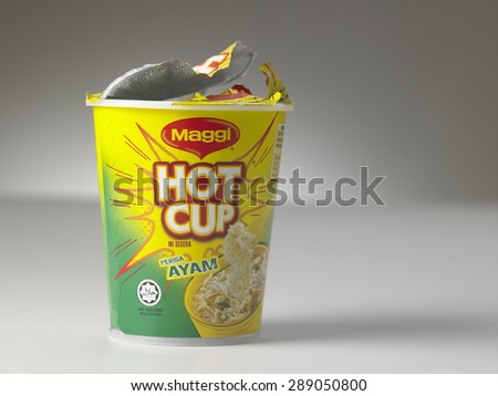 KUALA LUMPUR, MALAYSIA - june 6TH, 2015.Maggi Hot Cup. Owned by Nestle, Maggi is an international brand of soups, stocks, bouillon cubes, ketchups, sauces, seasonings and instant noodles
