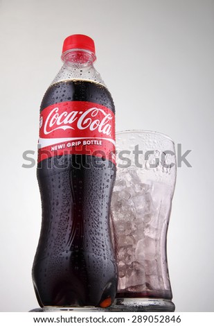 KUala Lumpur,Malaysia 27th April 2015,150ml coca cola Classic Bottle and a glass on white background.