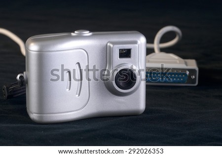 outdated digital camera with printer cable