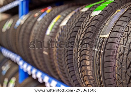 Car tires at warehouse in tire store