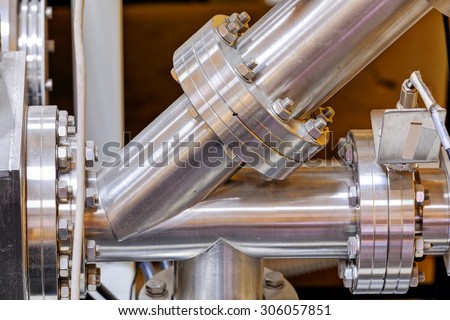 Detail of stainless steel machinery in physics laboratory