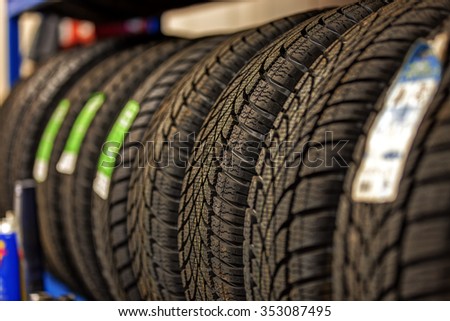 Car tires at warehouse in tire store