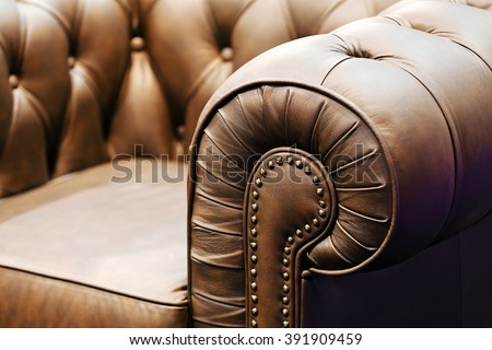 Detail of classic furniture sofa in living room.