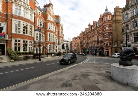 LONDON, UK - DECEMBER 31: Scenic view of old Victorian houses lining Mount Street in London, England on DECEMBER 31, 2014.