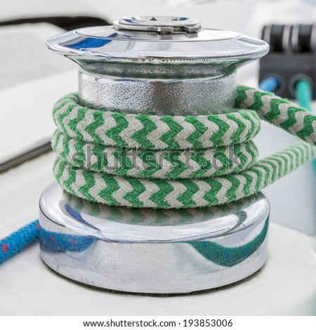 Sail boat - close up on winch and rope