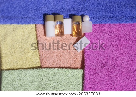 different cosmetic for body,shampoo, body wash, bath towel,