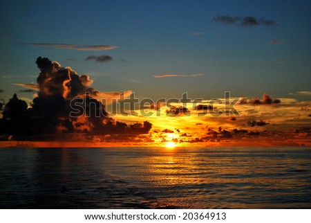 sun clouds and ocean
