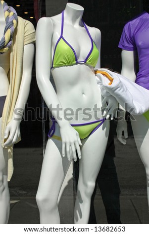 Mannequins in a clothing store window