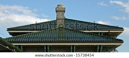 The roof and chimney of a train station