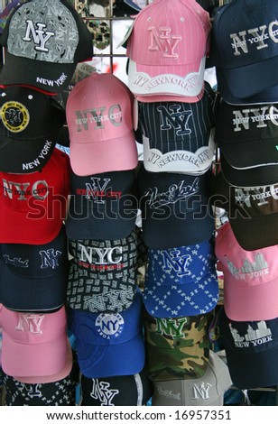 A rack of souvenir hats from New York City
