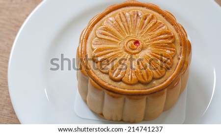 Moon Cake close up on old wood table , Chinese Culture