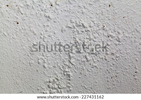 Dirty and swollen paint wall. white background