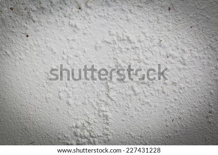 Dirty and swollen paint wall. white background crossify