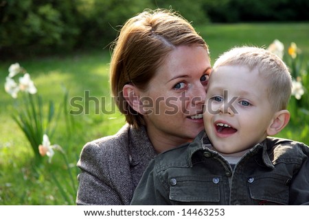 Mother and son whispering