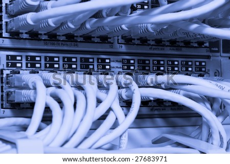 Toned image of network cables connected to switch