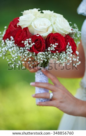 Beautiful bouquet in the bride\'s hands, detail shoot
