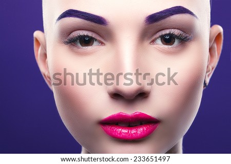 bald woman, close-up bright, skin, pink lips, purple eyebrows