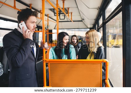 Man Talking on Cell Phone, public transportation, ride a bus