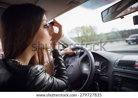 painted woman driving a car,  transportation, travel,