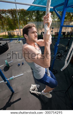 Fitness Rope Climb Exercise In Fitness Gym Workout