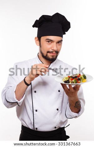 cook man happy with salad, vegetarian