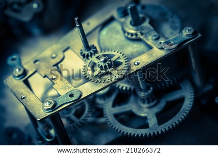 Macro shot of the clock mechanism. color toned  image. Cross process.