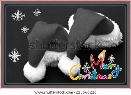 ,,Merry Christmas,,color letters record on the right,two black and white Santa hats,snowflakes