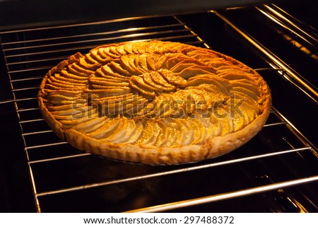 Traditional French apple pie in the oven