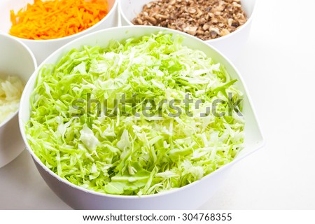Cooking Background - chopped vegetables in plates for vegetable soup