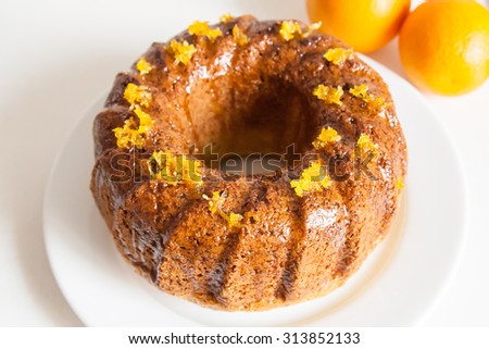 Orange cake glazed with orange zest