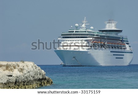 Cruise ship anchored off an island in the Bahamas