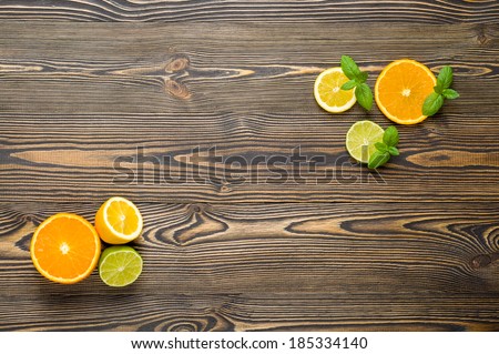 Mix citrus fresh fruit on the white wooden table, top view