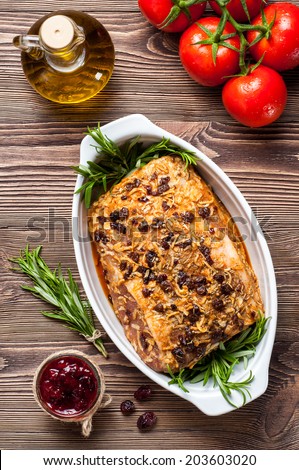 Roasted pork loin with cranberry and rosemary preparation