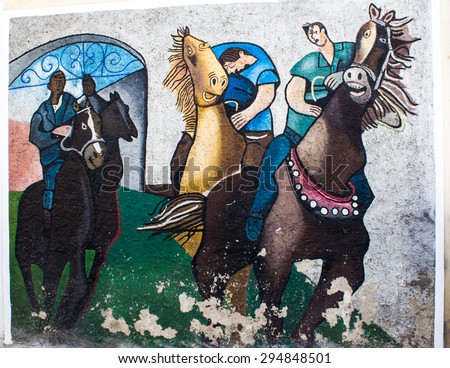 ORGOSOLO, ITALY - JUNE 26, 2015 - typical wall paintings on the streets of Orgosolo, a small town in Sardinia, Italy