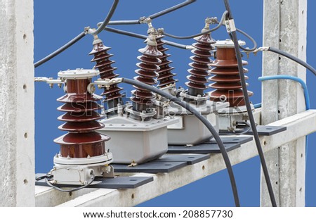 Outdoor High Voltage Instrument Transformers isolated on blue background