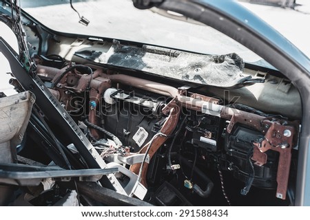 Crashed car in dismantling yard.