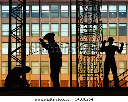 A group of workers working at construction site