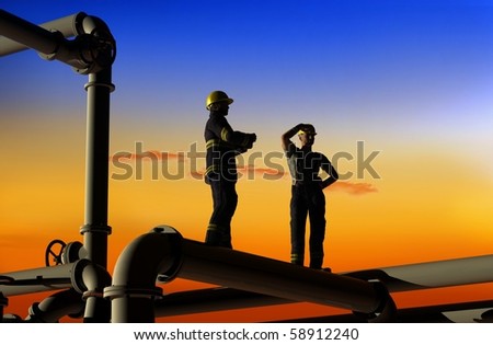 Oil workers on a background of the sky