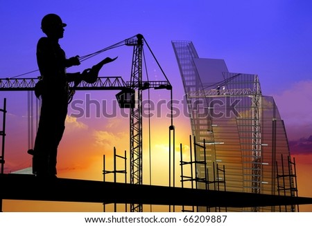 Silhouette of the worker on a background of the sky