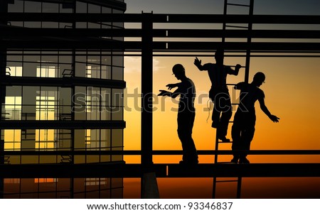 Silhouette of a workers  on the stairs.