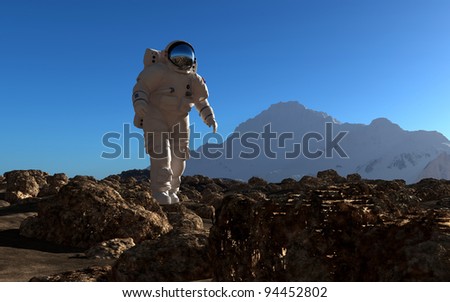 The astronaut  on the background of the planet.