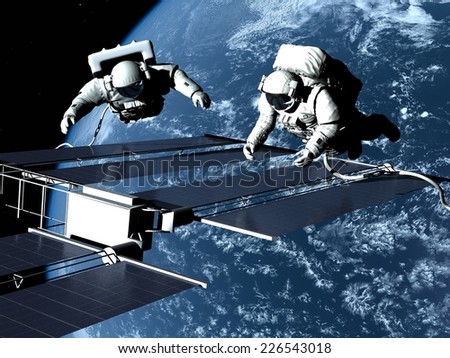 Astronauts in space around the solar battarei.\
